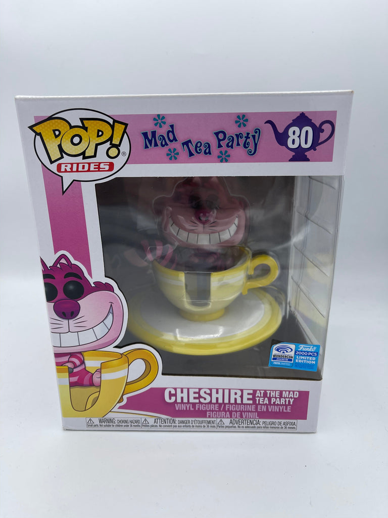 https://www.undiscoveredrealm.com/cdn/shop/products/funko-pop-rides-disney-mad-tea-party-cheshire-cat-at-the-mad-tea-party-exclusive-limited-to-2000-light-box-damage-sticker-peeling-funko-885327_1024x1024.jpg?v=1686657633